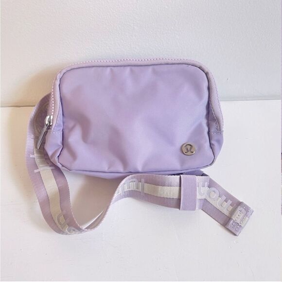 NWOT Lululemon Everywhere Belt Bag 1L
Wordmark- Lilac Ether/White Opal/White - Picture 2 of 16